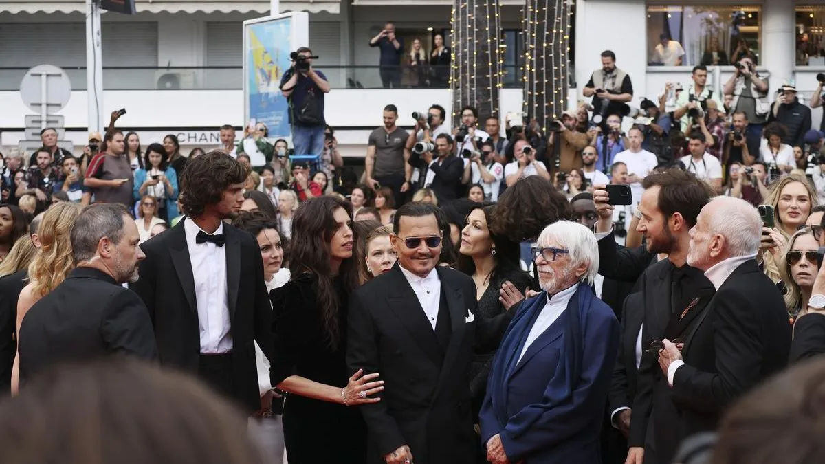 Johnny Depp's film 'Jeanne Du Barry' opened the 76th Cannes Film Festival with a remarkable seven-minute standing ovation. The actor, who plays King Louis XV in the movie, was visibly emotional as the crowd erupted in applause. This marks Depp's acting comeback after a three-year hiatus and a legal battle with ex-wife Amber Heard. Read on to watch the touching moment and learn more about the film's premiere at Cannes.