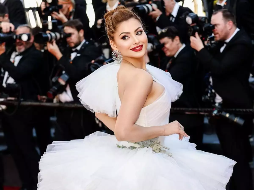 Miss World 2017 and talented actress Manushi Chhillar captivated the audience at the Cannes Film Festival 2023 as she made her grand red carpet debut in a magnificent white gown. With her Cinderella-like appearance, Manushi impressed everyone with her grace and elegance. Get a glimpse of her enchanting outfit and find out more about her Cannes experience.

