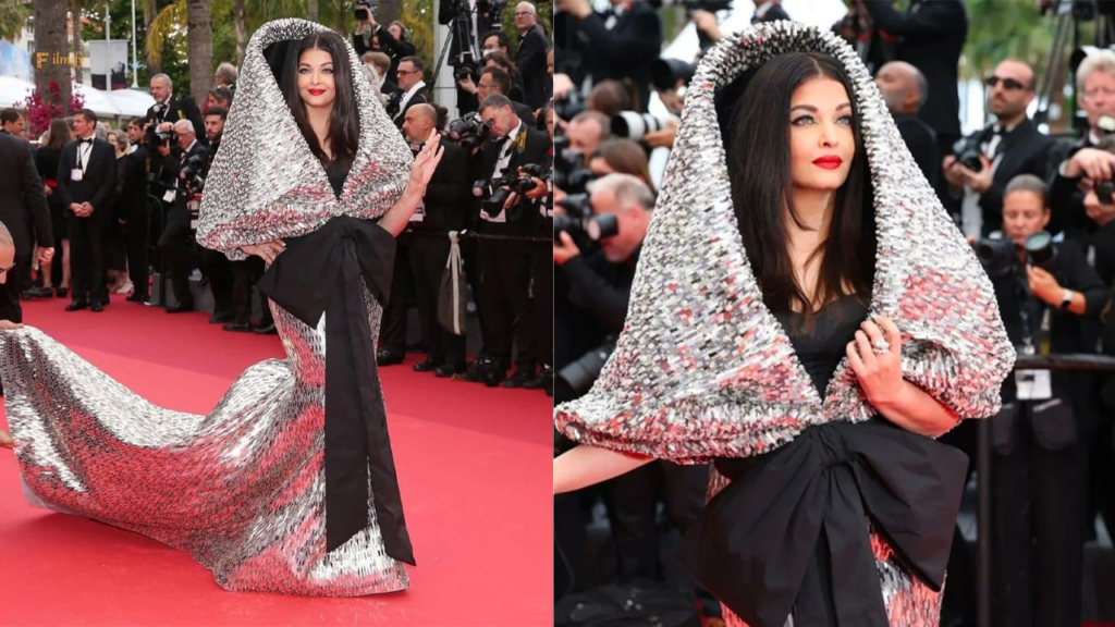 Aishwarya Rai Bachchan captivates everyone with her remarkable presence at Cannes 2023. She stuns on the red carpet in a black and silver outfit, showcasing her impeccable fashion sense. Take a look at the pictures from her memorable appearance.

