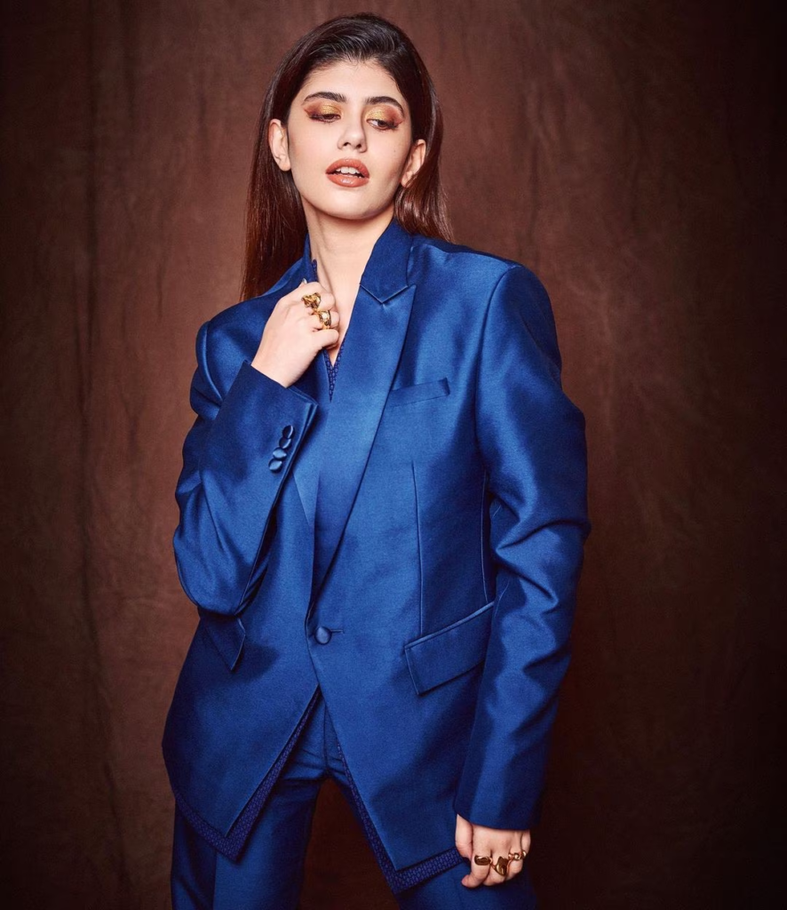 Sanjana Sanghi took to Instagram to share breathtaking pictures of herself in a blue pant suit, radiating confidence and boss vibes. The talented actress accessorized her outfit with stylish rings and completed the look with light makeup and heels. Check out the stunning pictures that showcase Sanjana's impeccable fashion sense and charisma.

