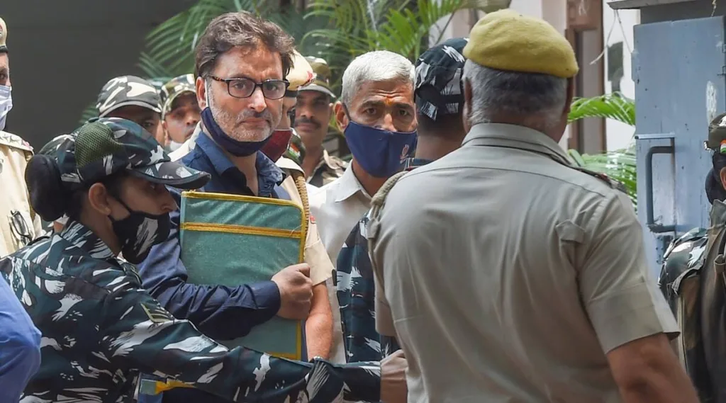 The Delhi High Court has issued a notice to Yasin Malik, the chief of Jammu and Kashmir Liberation Front (JLF), in response to the National Investigation Agency's (NIA) plea seeking the death penalty for the separatist leader. Malik had been sentenced to life imprisonment by a trial court in a terror funding case. The NIA argued that not giving capital punishment to a "dreaded terrorist" like Malik would result in a miscarriage of justice. The plea has sparked controversy, with the Hurriyat Conference expressing deep concern and former chief minister Mehbooba Mufti calling for a review of Malik's case.