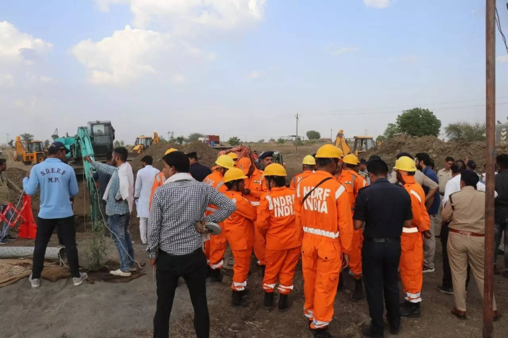 Efforts are still ongoing for the third consecutive day to rescue a two-and-a-half-year-old girl named Srishti, who fell into a 300-foot deep borewell in Madhya Pradesh's Sehore. Robotic experts have joined the rescue operation, as the girl is stuck at a depth of nearly 100 feet. Stay updated with the latest photos of the rescue mission.