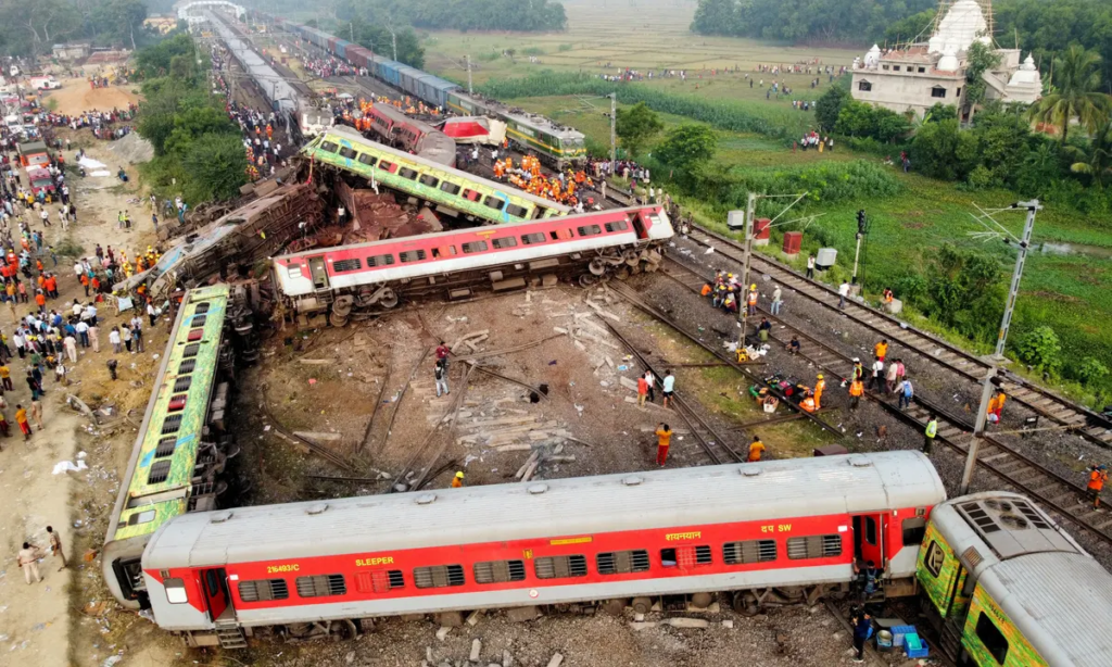 In a tragic train collision in Odisha's Balasore, at least 238 people have lost their lives and over 900 others have been injured. Aerial footage of the accident site captures the devastating visuals of chaos and overturned coaches. Learn more about this horrific incident and the ongoing rescue operations.

