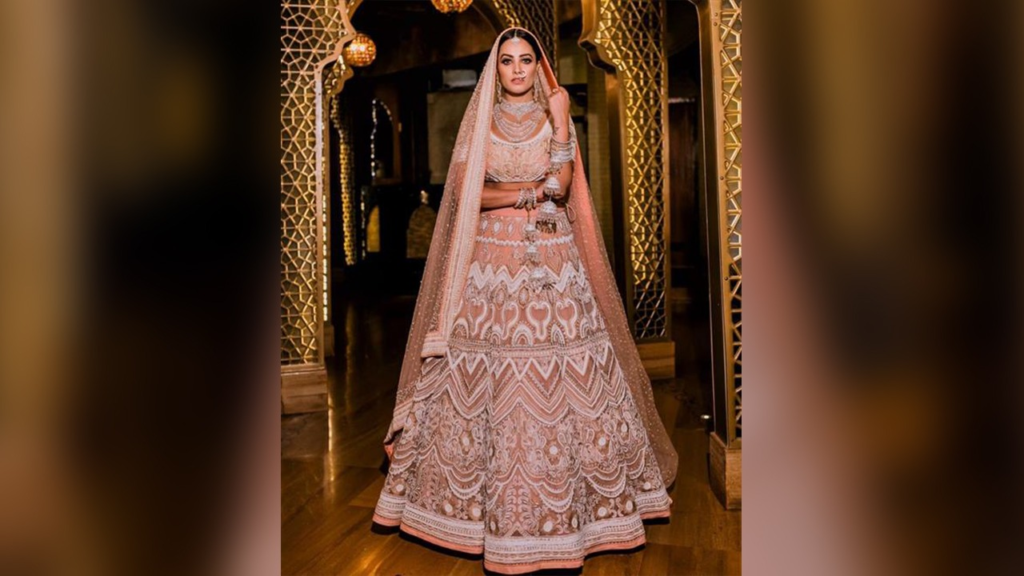 Surbhi Jyoti, the talented diva, leaves her fans spellbound as she shares a series of pictures on Instagram donning a mesmerizing embellished lehenga. Explore the scintillating images and get captivated by her ethnic charm and enchanting beauty.

