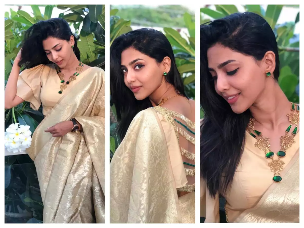 "Aishwarya Lekshmi captivates hearts with her stunning appearance in a beige saree during the promotions of 'King Of Kotha.' The actress, alongside co-star Dulquer Salmaan, has been turning heads with her impeccable style and elegance."
