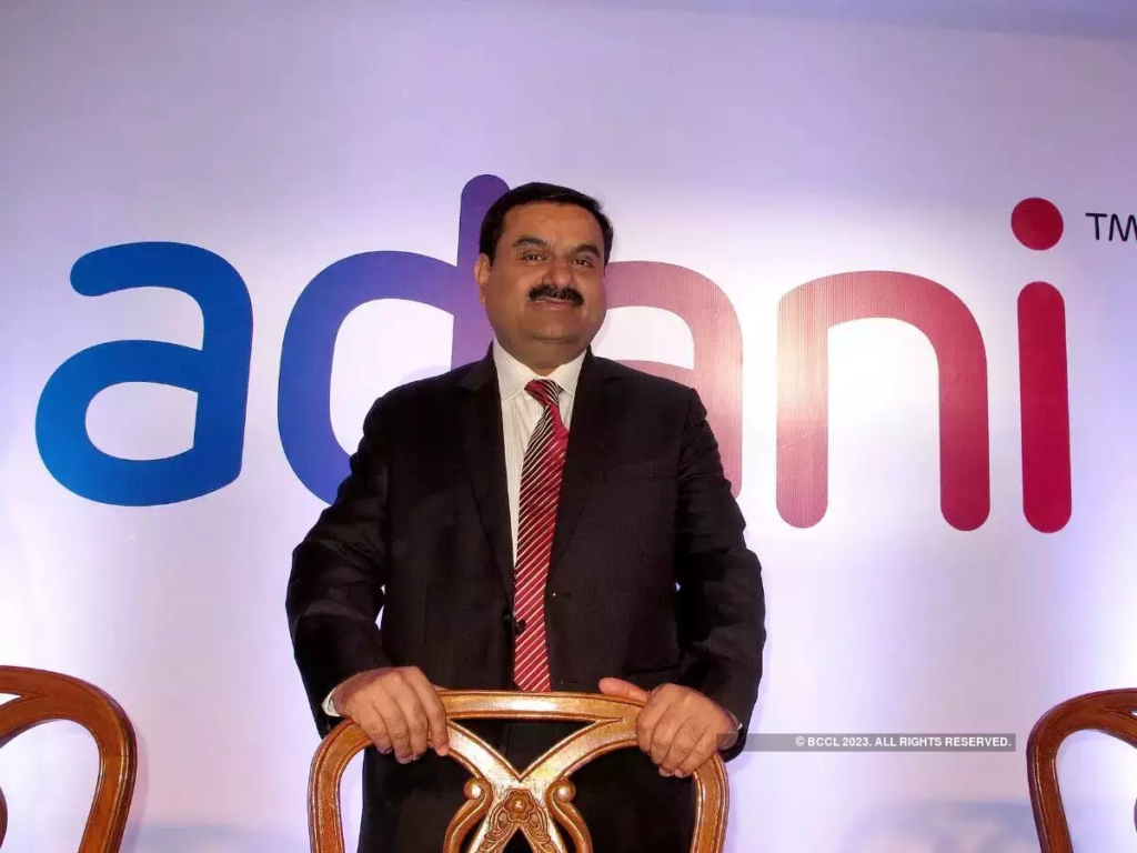 "Opposition parties criticize Modi government for appointing Adani Energy advisor to key environmental committee, raising concerns over transparency and impartiality."
