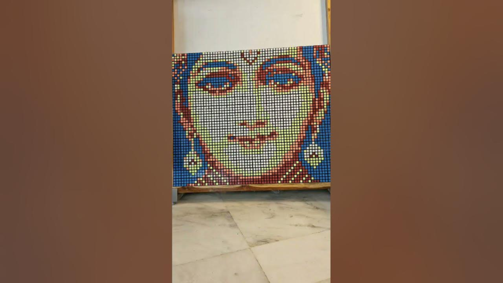 "Experience the awe-inspiring creativity of an 11-year-old from Hyderabad as he crafts a remarkable Rubik’s Cube mosaic depicting Lord Ram. The internet is buzzing with admiration for this young artistic genius!"
