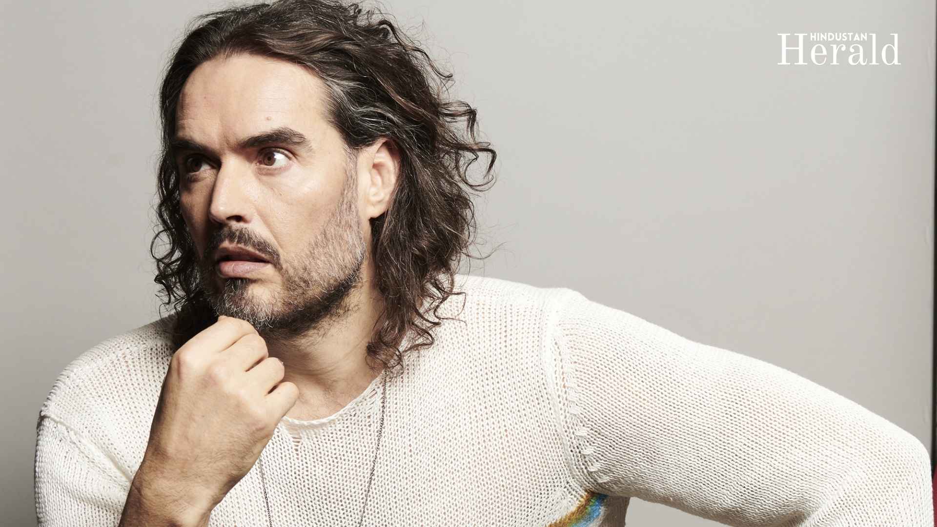 Russell Brand charged